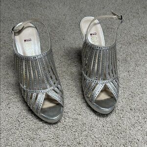 Live from the red carpet, silver, and rhinestone heels